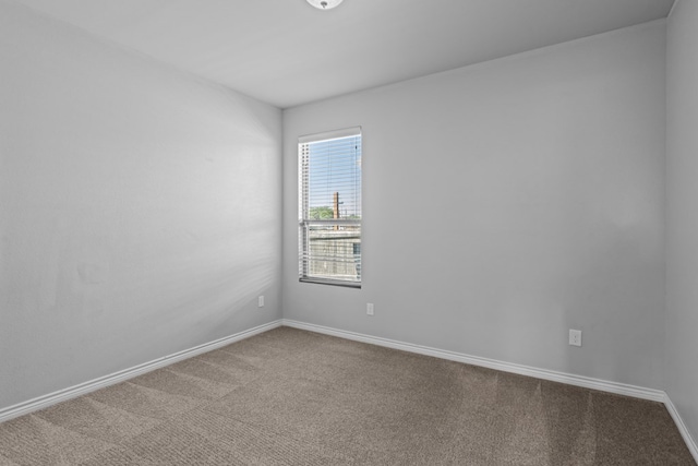 2208 Boise Dr, Odessa, TX 79762 - carpeted empty room featuring baseboards