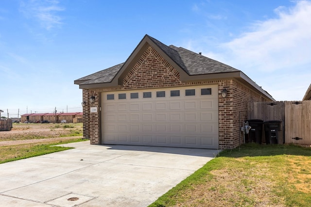 2208 Boise Dr, Odessa, TX 79762 - view of front facade with brick siding, roof with shingles, and driveway