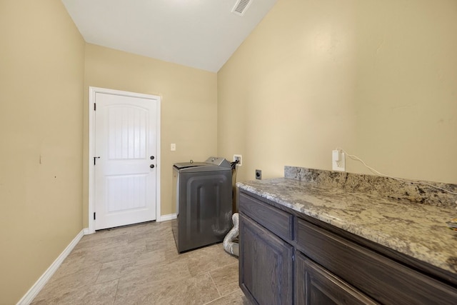 14 Da Vinci Ct, Odessa, TX 79765 - laundry room featuring washer / clothes dryer, baseboards, and cabinet space