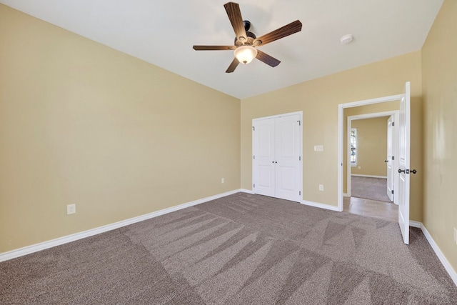 14 Da Vinci Ct, Odessa, TX 79765 - unfurnished bedroom with carpet, baseboards, ceiling fan, and a closet