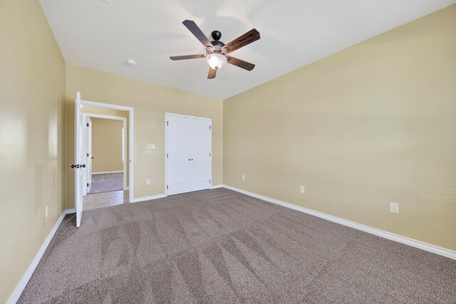 14 Da Vinci Ct, Odessa, TX 79765 - unfurnished bedroom with carpet, baseboards, ceiling fan, and a closet