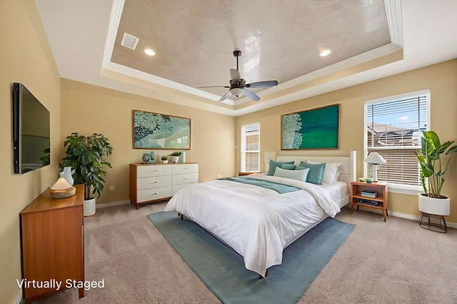14 Da Vinci Ct, Odessa, TX 79765 - bedroom with a tray ceiling, light colored carpet, baseboards, and recessed lighting