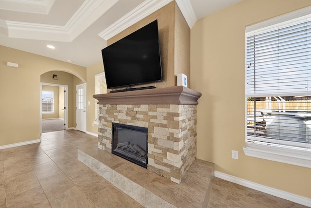 14 Da Vinci Ct, Odessa, TX 79765 - unfurnished living room with a fireplace, arched walkways, healthy amount of natural light, crown molding, and recessed lighting