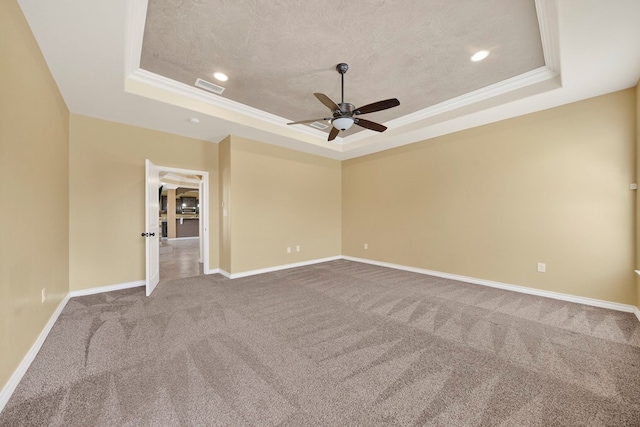 14 Da Vinci Ct, Odessa, TX 79765 - carpeted empty room with a tray ceiling, ceiling fan, baseboards, crown molding, and recessed lighting