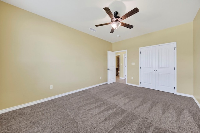 14 Da Vinci Ct, Odessa, TX 79765 - unfurnished bedroom with baseboards, carpet flooring, a closet, and a ceiling fan