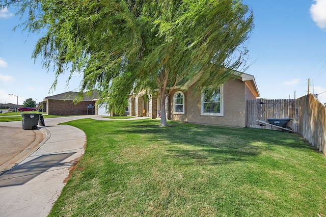 14 Da Vinci Ct, Odessa, TX 79765 - view of front facade with driveway and stucco siding