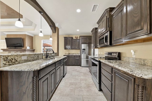 14 Da Vinci Ct, Odessa, TX 79765 - kitchen with appliances with stainless steel finishes, a sink, dark brown cabinets, light stone countertops, and hanging light fixtures