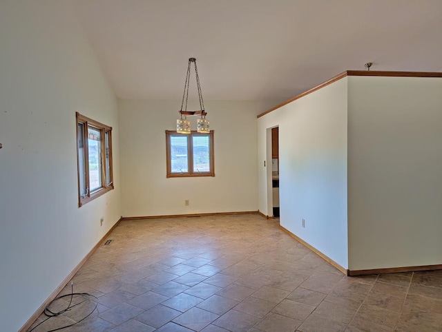 101 Hereford Dr, Fort Davis, TX 79734 - spare room featuring vaulted ceiling and stone finish floors