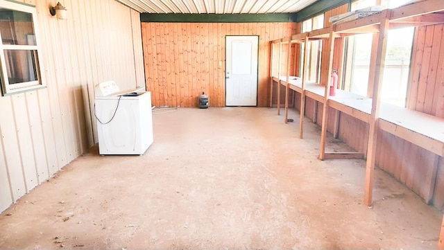 1000 N 12th St, Wink, TX 79789 - below grade area with wood walls and washer / dryer