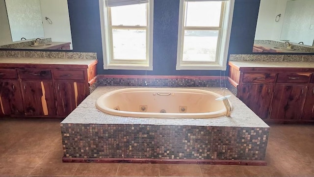 1000 N 12th St, Wink, TX 79789 - bathroom with vanity and a jetted tub