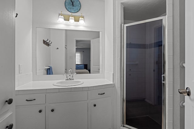 3700 Fairmont Dr, Odessa, TX 79762 - ensuite bathroom featuring vanity, a shower stall, and ceiling fan