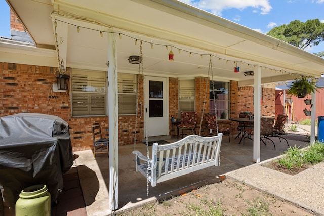 3700 Fairmont Dr, Odessa, TX 79762 - covered porch featuring a grill