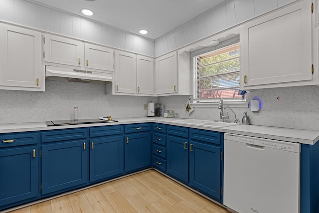 3700 Fairmont Dr, Odessa, TX 79762 - kitchen featuring dishwasher, under cabinet range hood, black electric cooktop, light countertops, and blue cabinetry