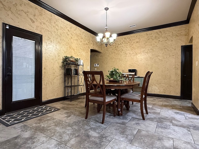 7802 Sienna Dr, Odessa, TX 79765 - dining area with crown molding, stone tile flooring, arched walkways, and a chandelier