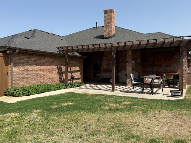 7802 Sienna Dr, Odessa, TX 79765 - back of property with a pergola, a patio area, a lawn, and brick siding