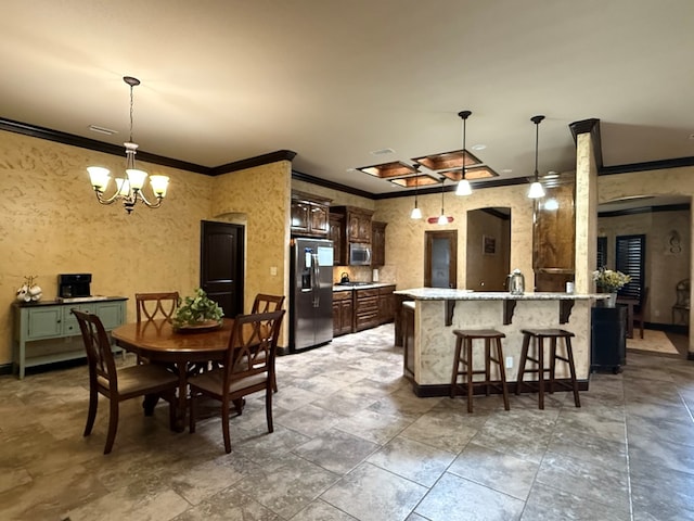 7802 Sienna Dr, Odessa, TX 79765 - dining space with ornamental molding and a chandelier