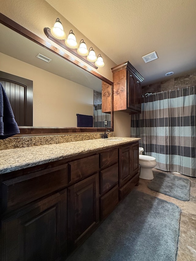 7802 Sienna Dr, Odessa, TX 79765 - bathroom featuring double vanity and a shower with shower curtain
