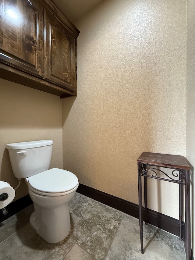 7802 Sienna Dr, Odessa, TX 79765 - bathroom with toilet and baseboards