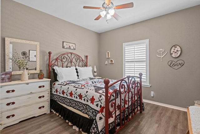 3960 Rabb St, Odessa, TX 79762 - bedroom featuring wood finished floors and a ceiling fan