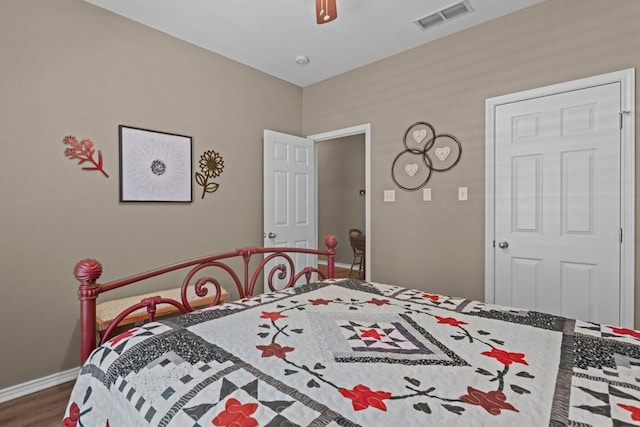 3960 Rabb St, Odessa, TX 79762 - bedroom with wood finished floors and ceiling fan