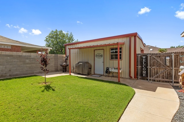 3960 Rabb St, Odessa, TX 79762 - view of outbuilding featuring a gate and a fenced backyard