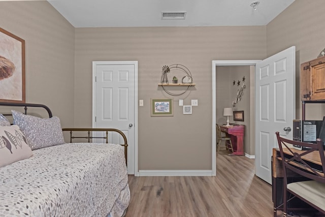 3960 Rabb St, Odessa, TX 79762 - bedroom with light wood finished floors and baseboards