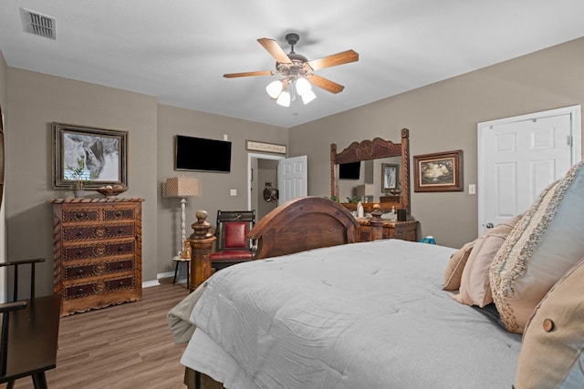 3960 Rabb St, Odessa, TX 79762 - bedroom with wood finished floors and a ceiling fan