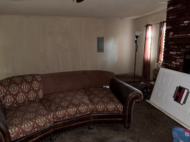 1140 Clifford St, Odessa, TX 79763 - living area with carpet floors, electric panel, and a ceiling fan