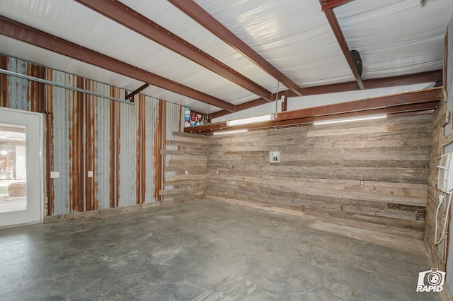 3201 Reo Dr, Midland, TX 79705 - garage featuring wood walls