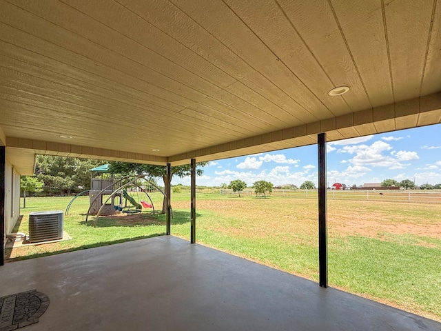 305 County Rd 306, Seminole, TX 79360 - view of patio with a playground and a view of countryside
