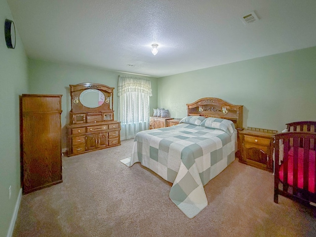 305 County Rd 306, Seminole, TX 79360 - bedroom featuring carpet floors and a textured ceiling