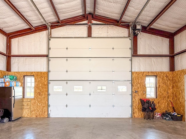 305 County Rd 306, Seminole, TX 79360 - garage featuring freestanding refrigerator