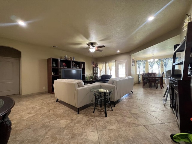 3717 S County Rd 1314, Odessa, TX 79765 - living area featuring ceiling fan, a chandelier, recessed lighting, a textured ceiling, and baseboards