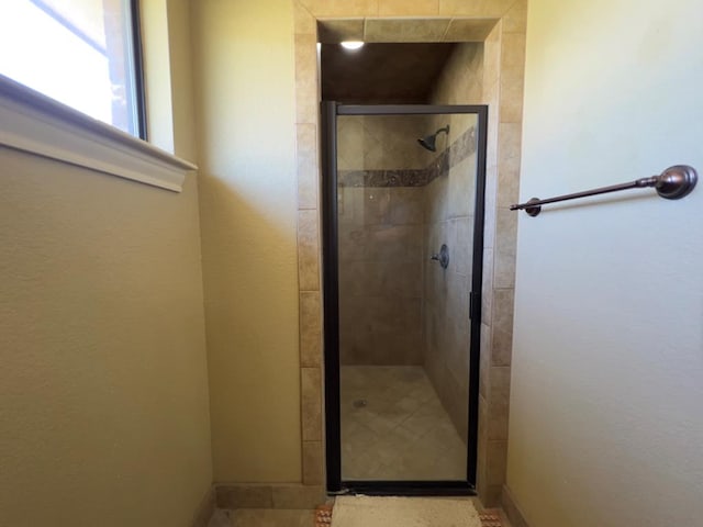 3717 S County Rd 1314, Odessa, TX 79765 - full bath with a shower stall and baseboards