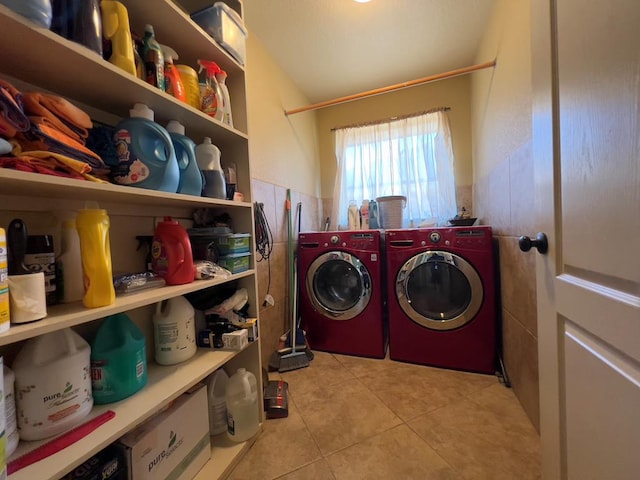 3717 S County Rd 1314, Odessa, TX 79765 - laundry room with washer and clothes dryer and light tile patterned flooring