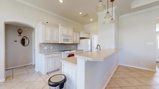 10901 E County Rd 108, Midland, TX 79706 - kitchen featuring white appliances, light tile patterned floors, light countertops, decorative backsplash, and a peninsula