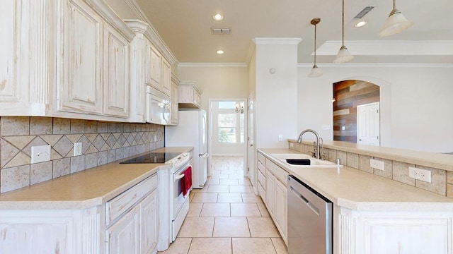 10901 E County Rd 108, Midland, TX 79706 - kitchen with white appliances, a sink, ornamental molding, backsplash, and arched walkways