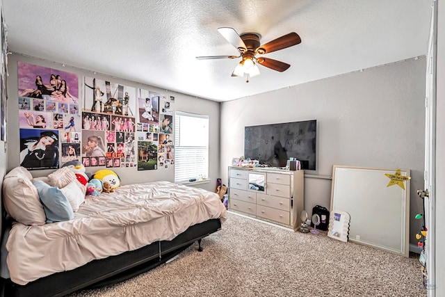 9540 W April St, Odessa, TX 79764 - bedroom featuring carpet flooring, a textured ceiling, and ceiling fan