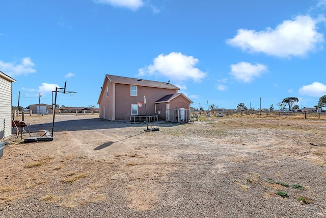 9540 W April St, Odessa, TX 79764 - back of property featuring stucco siding