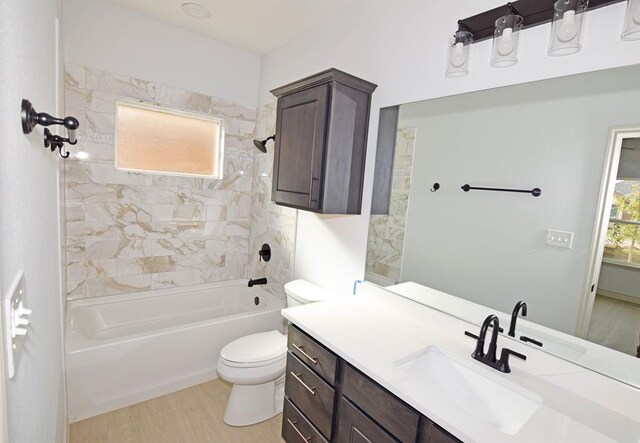 8639 Fortuna Ct, Odessa, TX 79765 - full bath with vanity, toilet, wood finished floors, and tub / shower combination