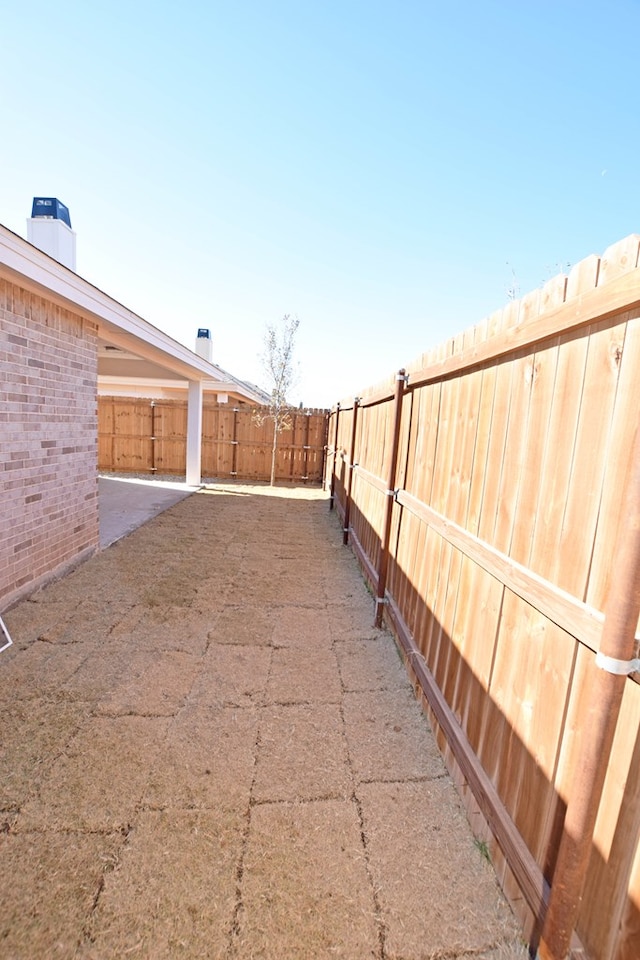 8639 Fortuna Ct, Odessa, TX 79765 - fenced backyard featuring a patio