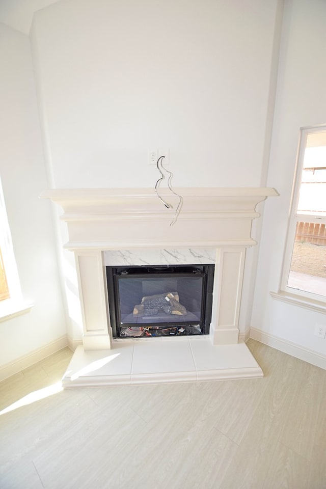 8639 Fortuna Ct, Odessa, TX 79765 - detailed view of a fireplace and baseboards