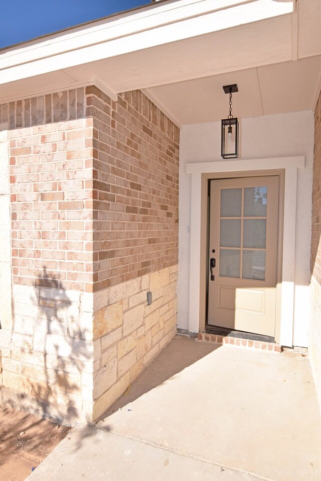 8639 Fortuna Ct, Odessa, TX 79765 - entrance to property with brick siding