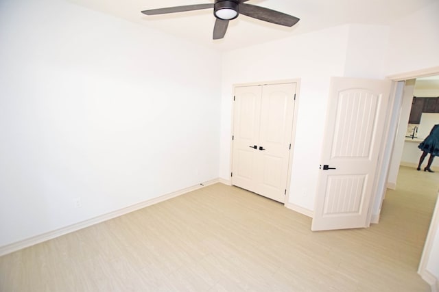 8639 Fortuna Ct, Odessa, TX 79765 - unfurnished room with a ceiling fan, light wood-style floors, and baseboards
