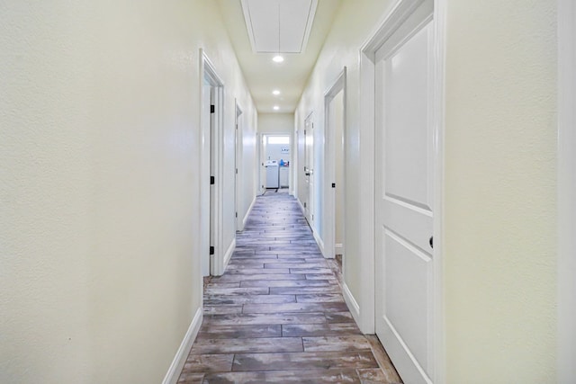 hallway featuring dark hardwood / wood-style floors