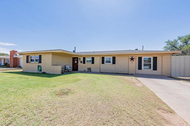 ranch-style house with brick siding and concrete driveway