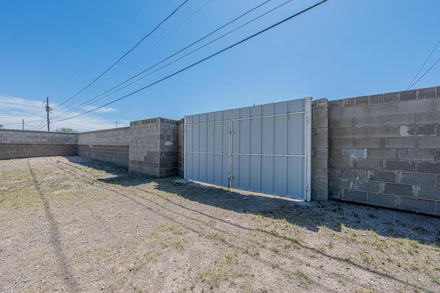 view of outdoor structure with a fenced backyard
