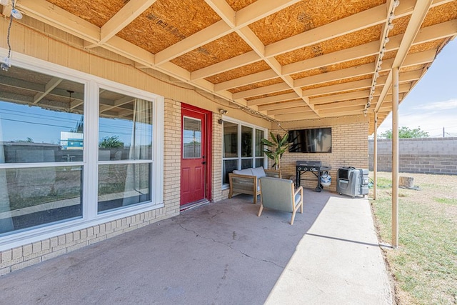 view of patio / terrace featuring fence and area for grilling