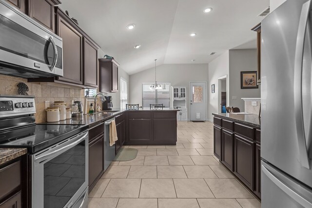 808 Brittlebush Ct, Odessa, TX 79765 - carpeted living room with a brick fireplace, ceiling fan, and baseboards