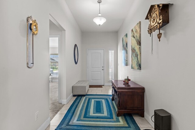 808 Brittlebush Ct, Odessa, TX 79765 - hall with tile patterned flooring and baseboards